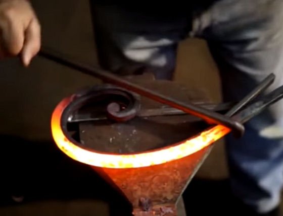 Blacksmith making curled bars - thank you for your order