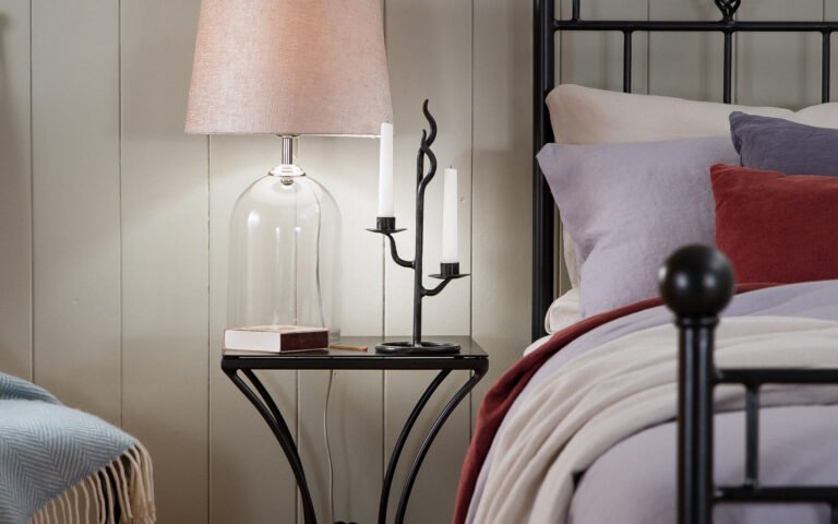 nights in iron twin candlestick in evening bedroom