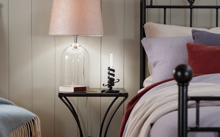 nights in iron spiral candlestick in evening bedroom
