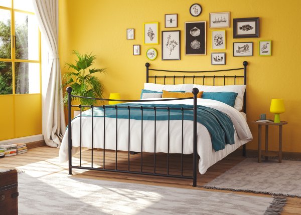Coppelia iron bed in yellow bedroom