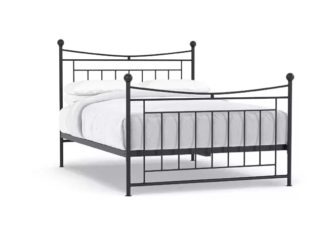 upholstered iron bed with curved headboard